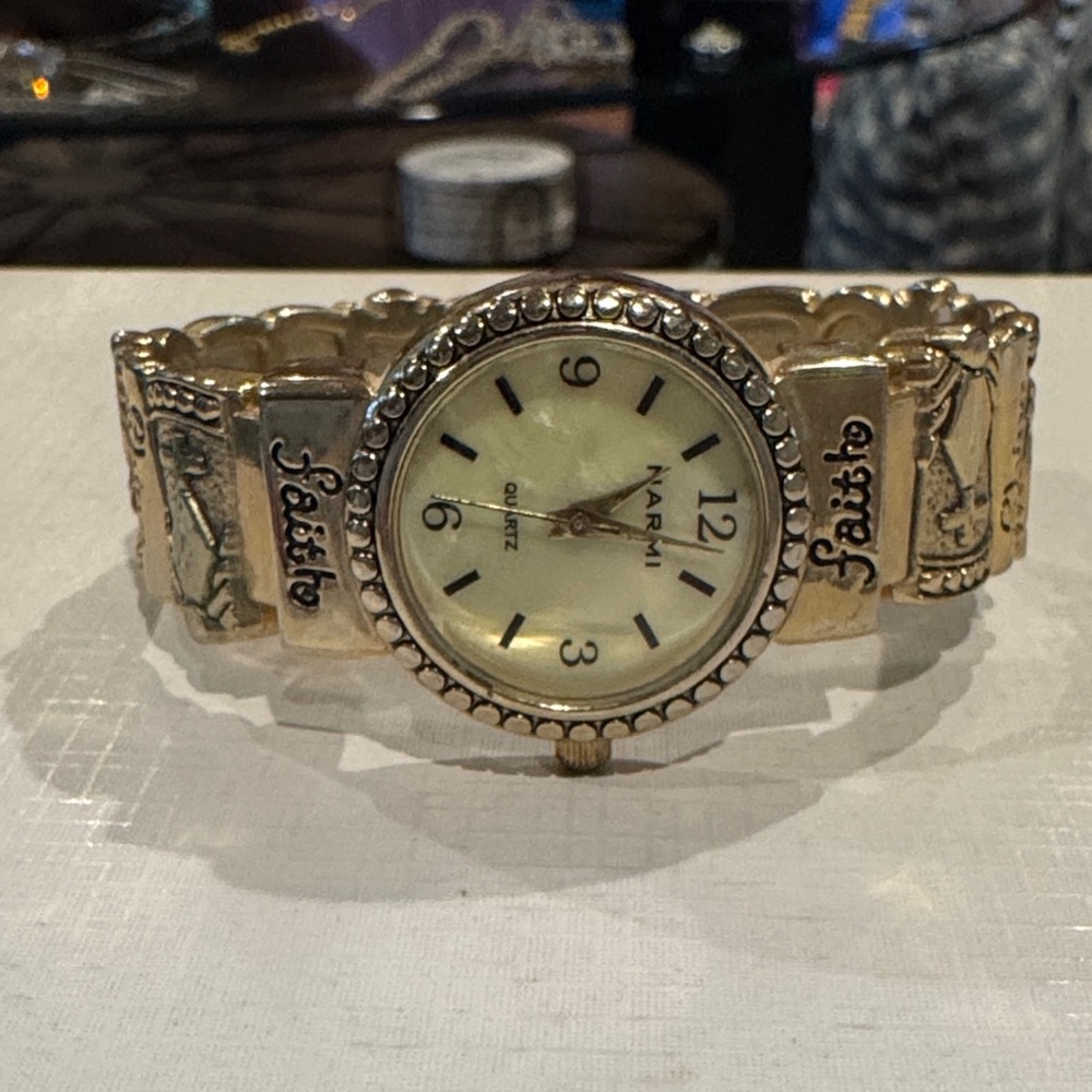 Narmi Gold Tone Stretch Bracelet Watch